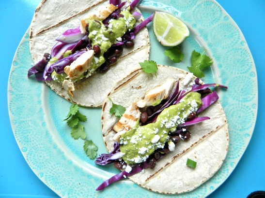 Chicken + Black Bean Tacos with Cilantro-Avocado-Lime Sauce via Simply Real Health